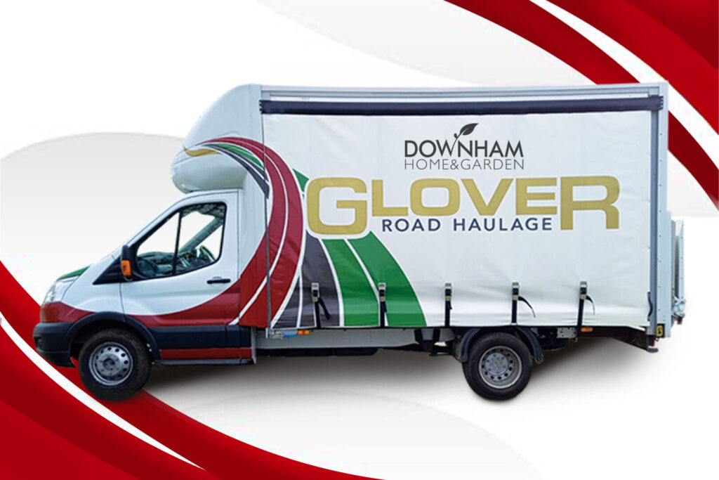 Downham Home & Garden branded delivery van with Glover Road Haulage logo and red, green, and gold graphics.